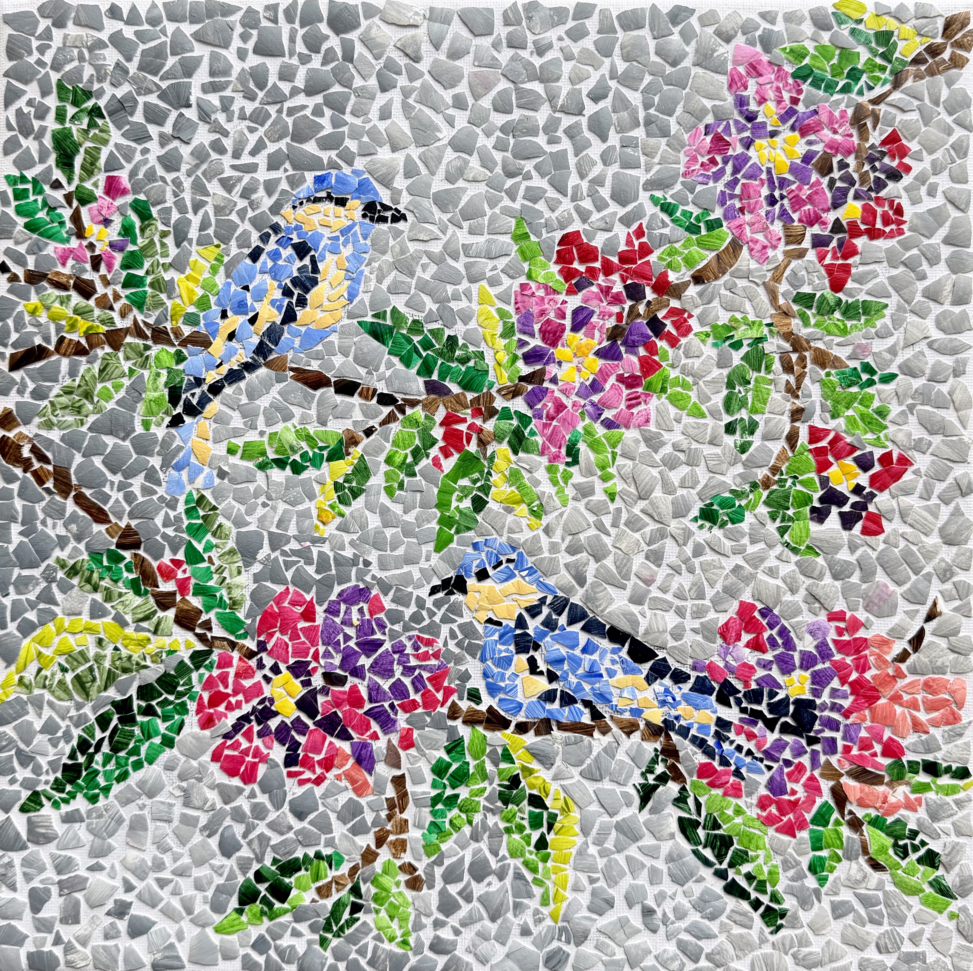 Square eggshell mosaic of two blue and yellow songbirds perched among branches of pink and purple blossoms