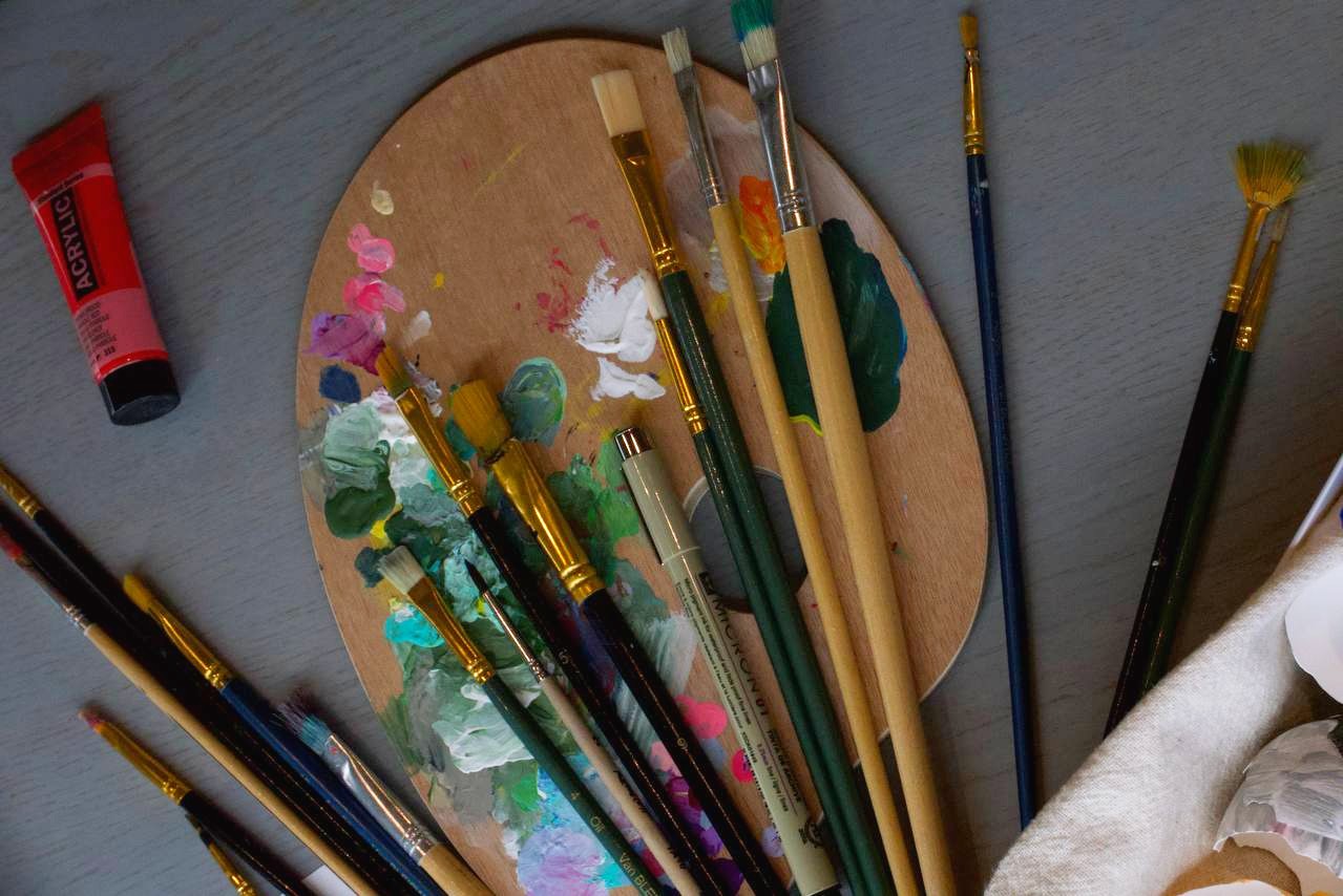 Studio palette with brushes and pigments
